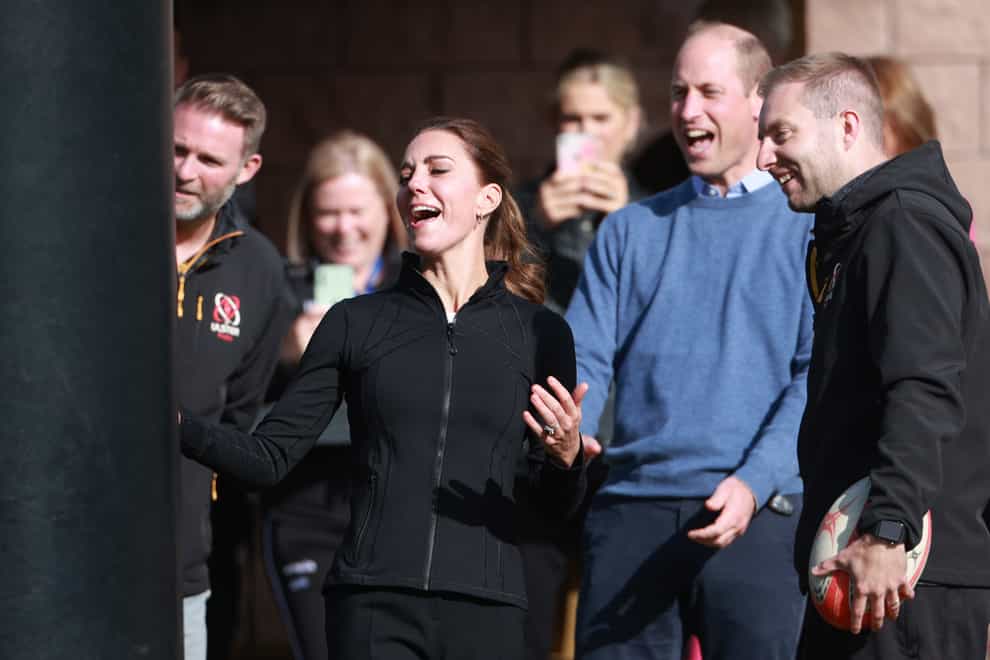 The Duke and Duchess of Cambridge during a visit to the City of Derry rugby club (PA)