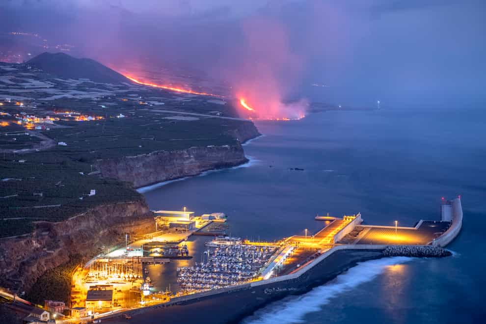 Lava from the volcano reaches the sea on the island of La Palma (Saul Santos/AP)