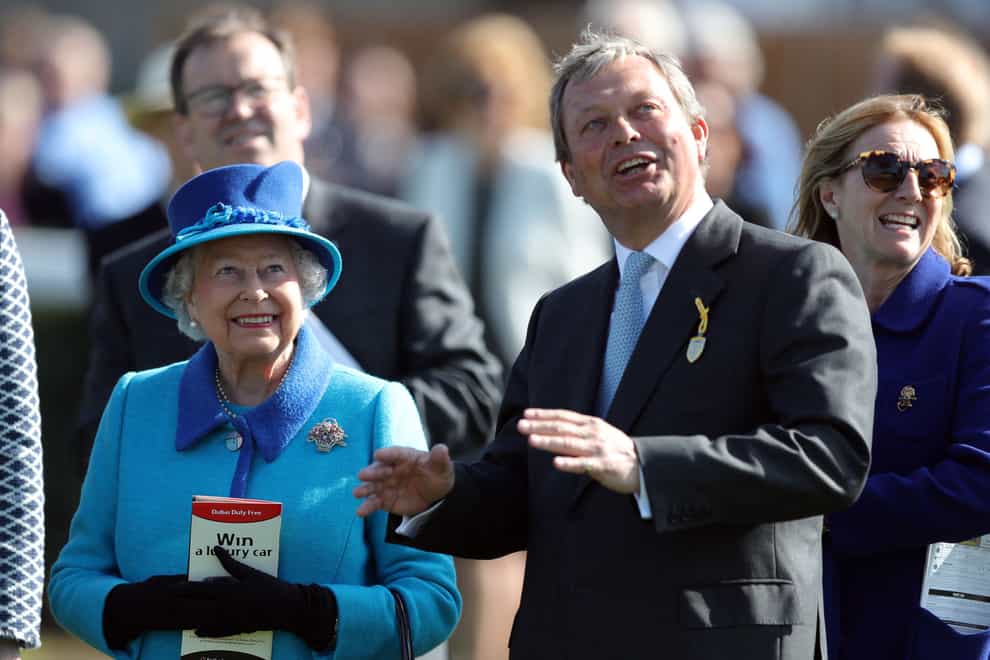 Queen Elizabeth II with trainer William Haggas (Andrew Matthews/PA)