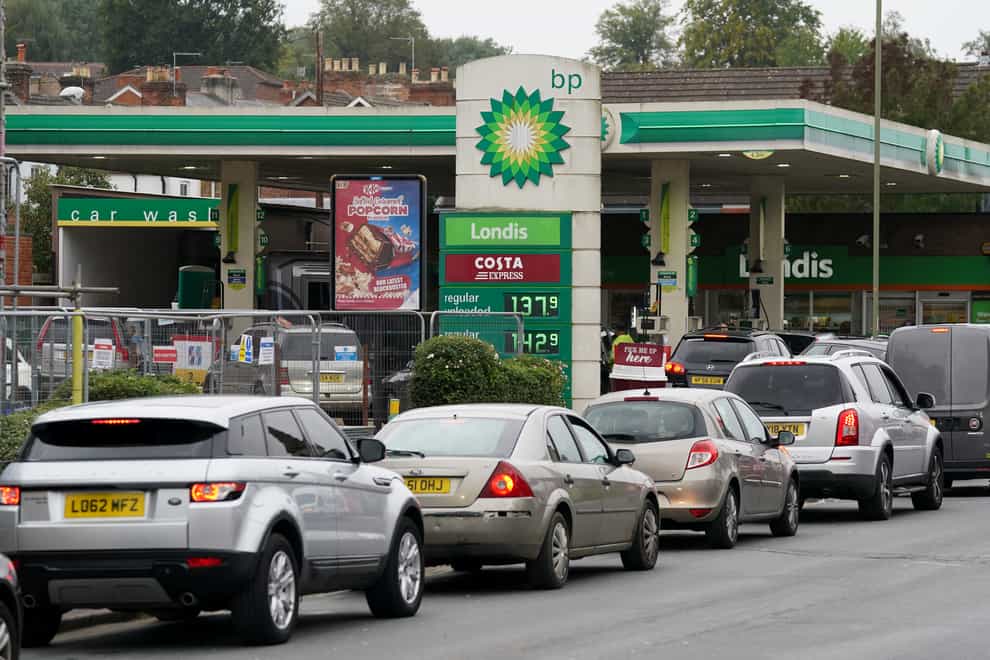 Vehicles queue up outside a BP petrol station in Alton, Hampshire (Andrew Matthews/PA)