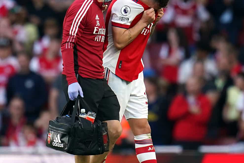 Arsenal midfielder Granit Xhaka was forced off against Tottenham with a serious knee injury (Nick Potts/PA)