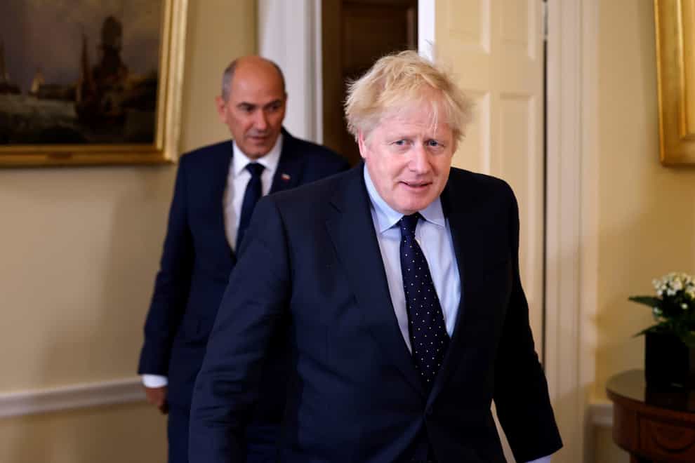 Britain’s Prime Minister Boris Johnson, right (Tolga Akmen/PA)
