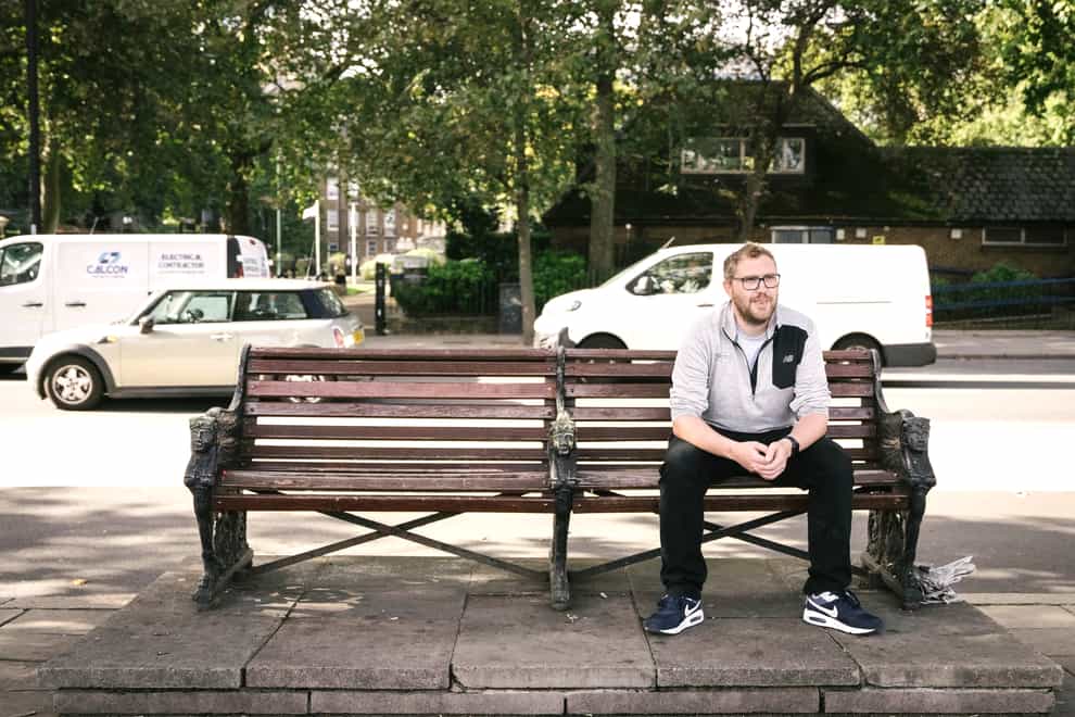 Jay Flynn on the bench he once slept on (Martyna Przybysz/PA)