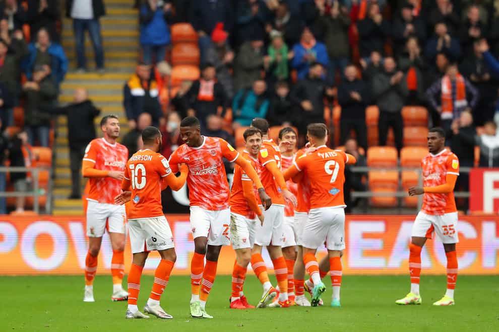 Blackpool’s Jerry Yates (second right) celebrates with his team-mates (Tim Markland/PA)