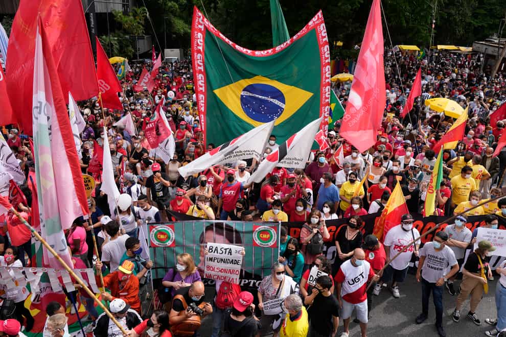Demonstrators join a protest against Brazilian President Jair Bolsonaro (Andre Penner/AP)