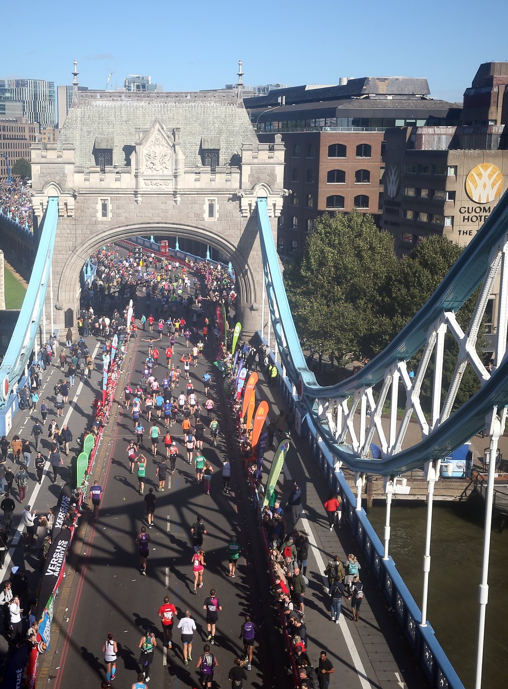 Runners cross over Tower Bridge during the Virgin Money London Marathon (Steven Paston/PA)