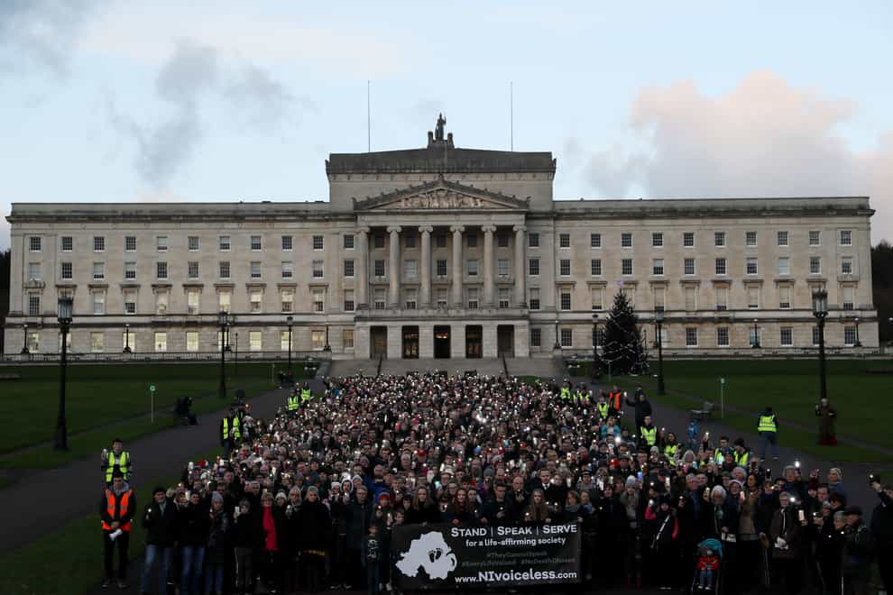 Anti-abortion protesters stage a silent demonstration at Stormont against the recent liberalisation of abortion laws in Northern Ireland (Brian Lawless/PA)