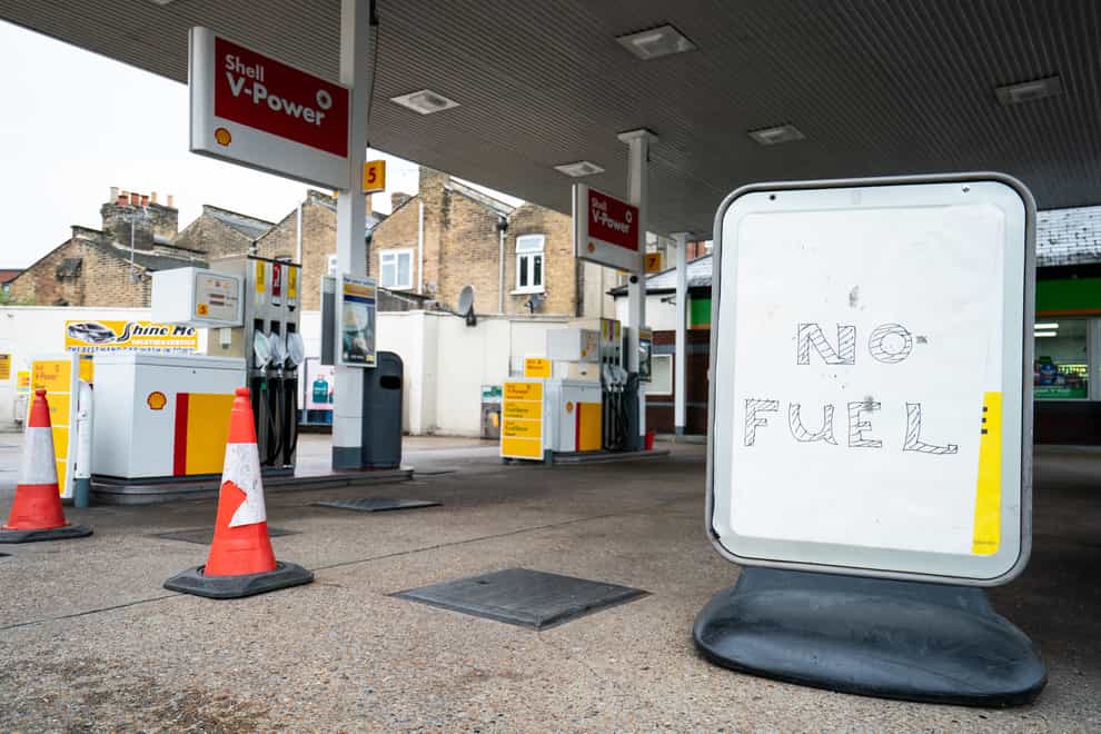 A ‘no fuel’ sign on the forecourt of a petrol station in London (Dominic Lipinski/PA)