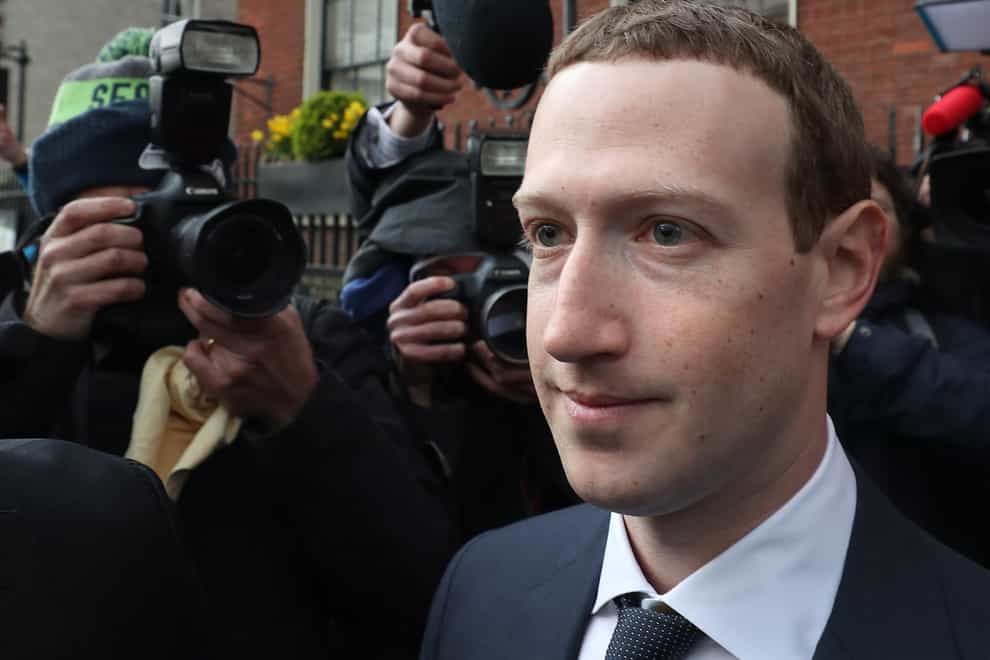 Mark Zuckerberg has defended Facebook after a whistleblower claimed it puts profit above safety (Niall Carson/PA)