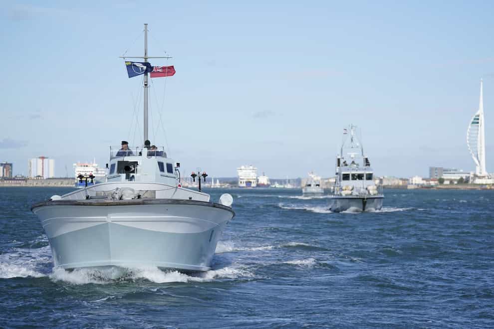 MTB 81, a Second World War Coastal Forces motor gun boat, left, and Royal Navy Archer class patrol vessel HMS Puncher make their way out into the Solent to give a demonstration ahead of a press preview for The Night Hunters: The Royal Navy’s Coastal Forces at War exhibition at the Explosion Museum of Naval Firepower in Gosport, Hampshire (Andrew Matthews/PA)