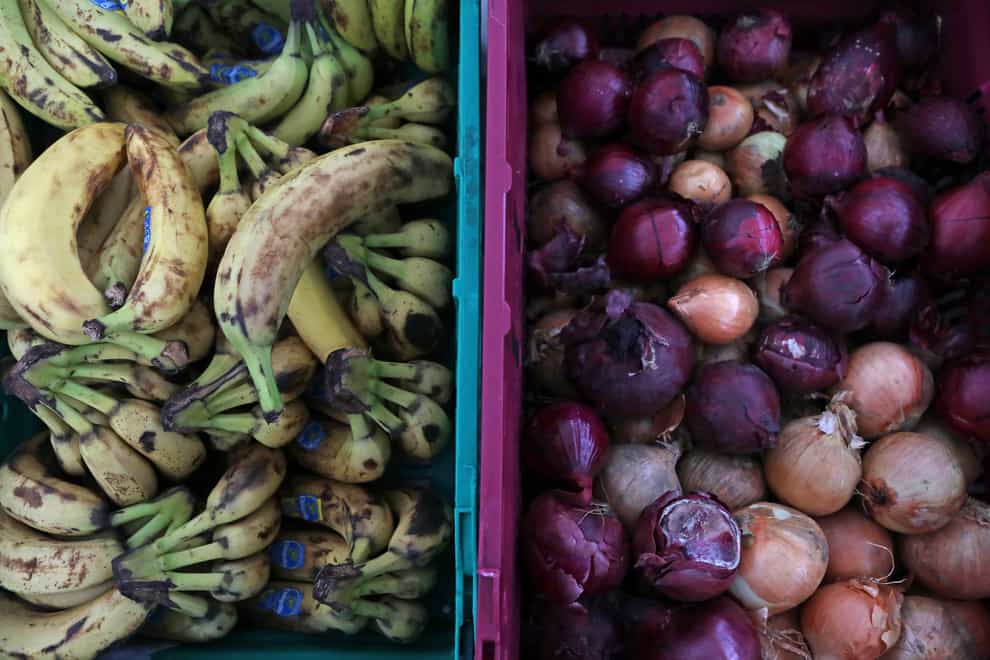 Food laid out in crates at a food bank in north London (Luciana Guerra/PA)