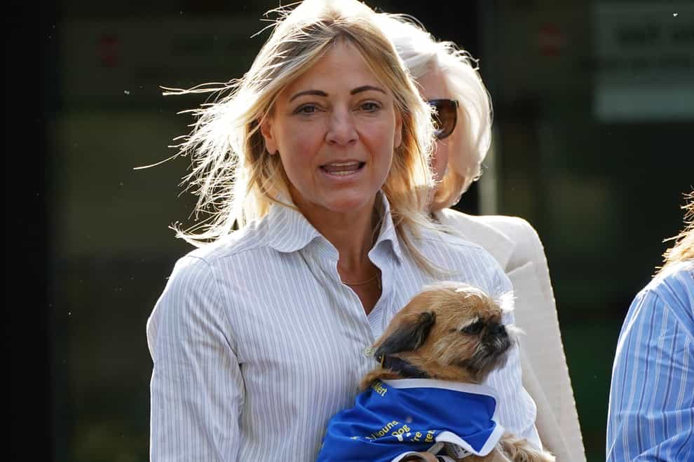Phillipa Copleston-Warren leaves Isleworth Crown Court in west London, with her support dog (Yui Mok/PA)