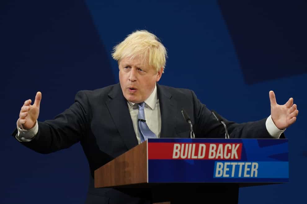 Prime Minister Boris Johnson delivers his keynote speech to the Conservative Party Conference in Manchester (Jacob King/PA)