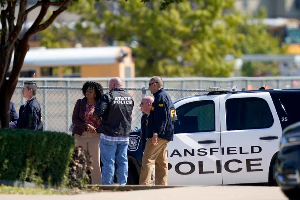 Law enforcement officers gather at Timberview High School (LM Otero/AP)