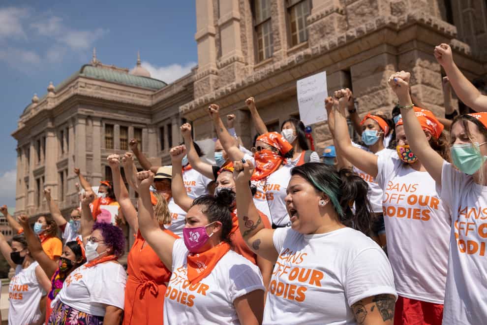 Women protesting against the Texas anti-abortion law in the state capital Austin. A federal judge has ordered Texas to suspend the law (Jay Janner/Austin American-Statesman/AP)