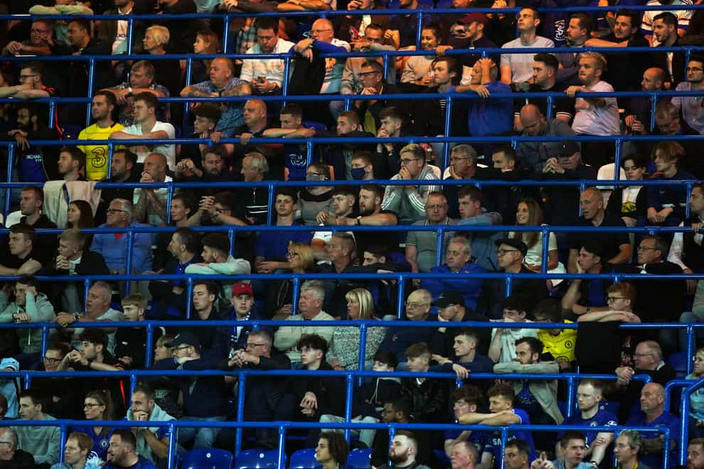 Fans watch the Chelsea v Aston Villa Carabao Cup tie from the safe standing area at Stamford Bridge (Mike Egerton/PA)