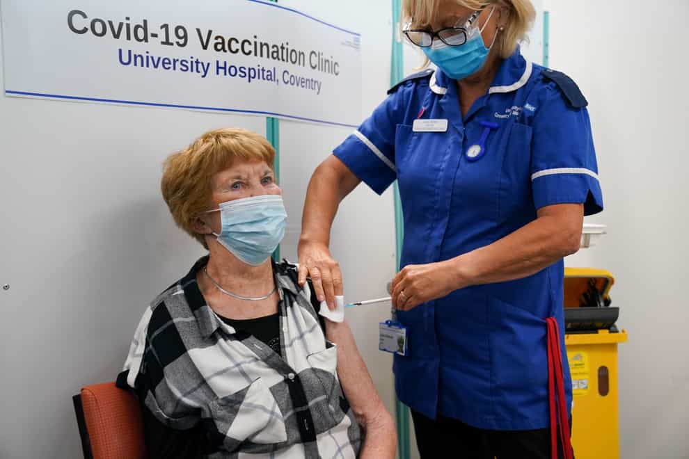 Margaret Keenan, the first person to receive the coronavirus vaccine in December last year, receives her booster jab at University Hospital Coventry, Warwickshire (Jacob King/PA)