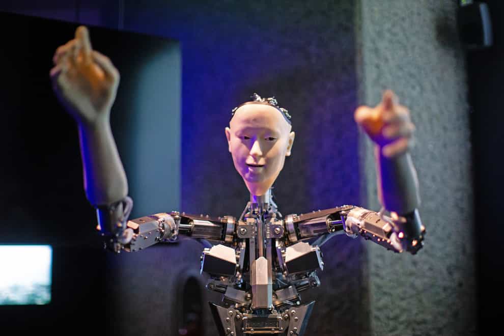 Roboticist Hiroshi Ishiguro’s ‘Alter’, a machine body with a human like face and hands who learns through interplaying (Aaron Chown/PA)