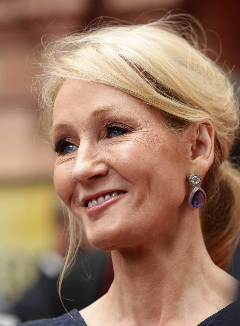 JK Rowling has joked she will have champagne and cheese on toast for the 25th anniversary of Harry Potter (Yui Mok/PA)