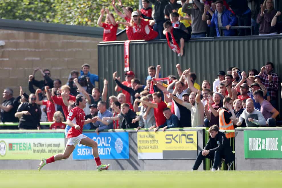 Harry McKirdy celebrates after putting Swindon 1-0 up at Forest Green (Bradley Collyer/PA)