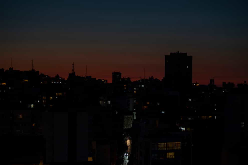The capital city of Beirut in darkness during a power outage earlier this year (Hassan Ammar/File/AP)