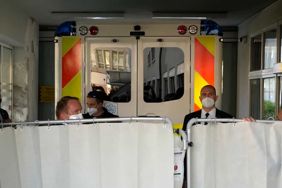 An ambulance carrying Milos Zeman arrives at the military hospital in Prague (Petr David Josek/AP)