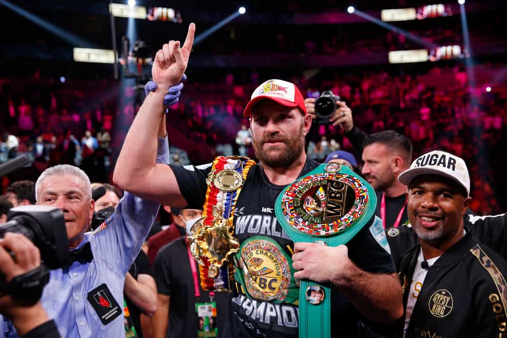 Tyson Fury, centre, declared himself the best heavyweight of his era after his win over Deontay Wilder (Chase Stevens/AP/PA)