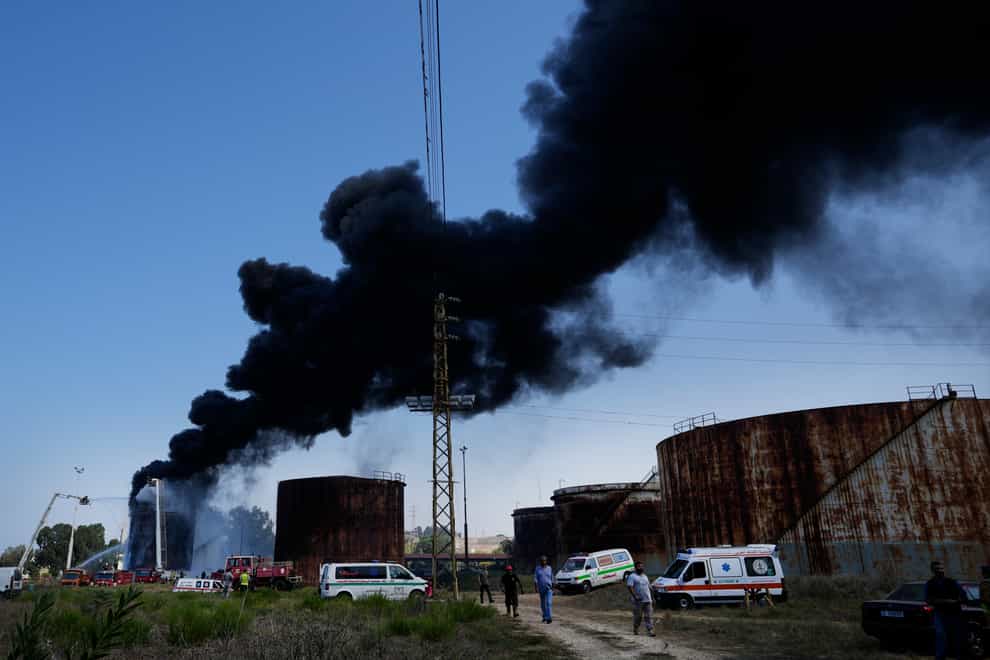 Smoke rises from an oil facility in the southern town of Zahrani, south of the port city of Sidon, Lebanon (Hassan Ammar/AP)