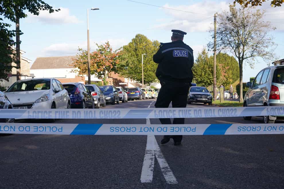 A police officer at the scene near the Belfairs Methodist Church in Eastwood Road North, Leigh-on-Sea, Essex, where Conservative MP Sir David Amess has died after he was stabbed several times at a constituency surgery. A man has been arrested and officers are not looking for anyone else. Picture date: Friday October 15, 2021.