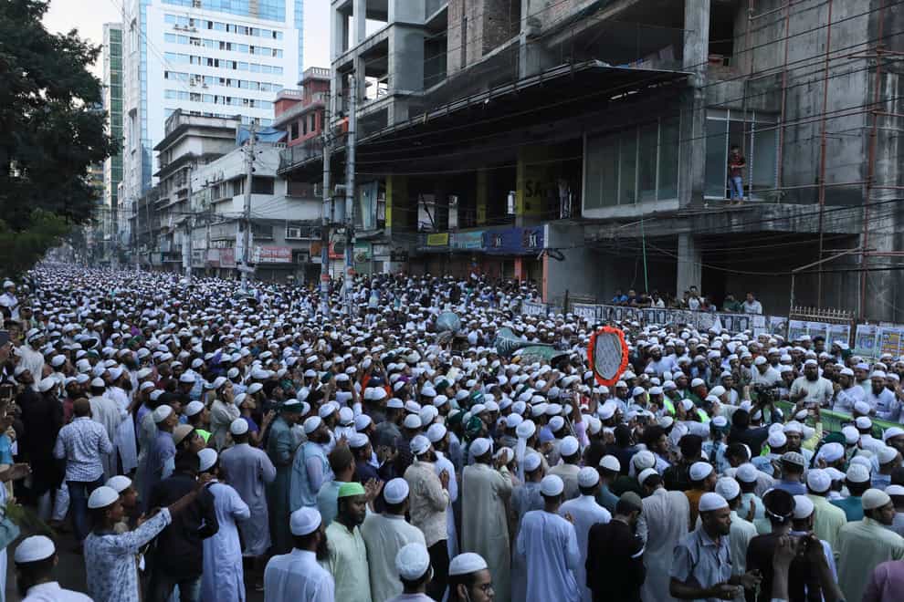 Muslims participate in a protest over an alleged insult to Islam, outside the country’s main Baitul Mukarram Mosque in Dhaka, Bangladesh (Abdul Goni/AP)