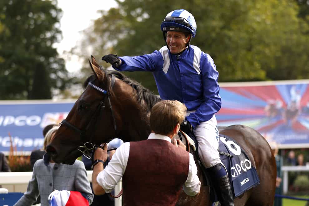 Jockey Jim Crowley celebrates with Baaeed after winning the Queen Elizabeth II Stakes (Sponsored by Qipco) during the Qipco British Champions Day at Ascot Racecourse (Steven Paston/PA)