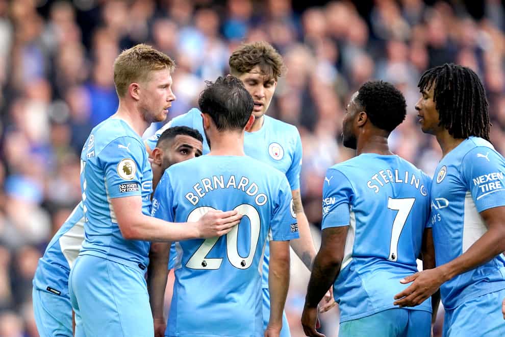 Manchester City’s Kevin De Bruyne, left, celebrates with his team-mates (Martin Rickett/PA)