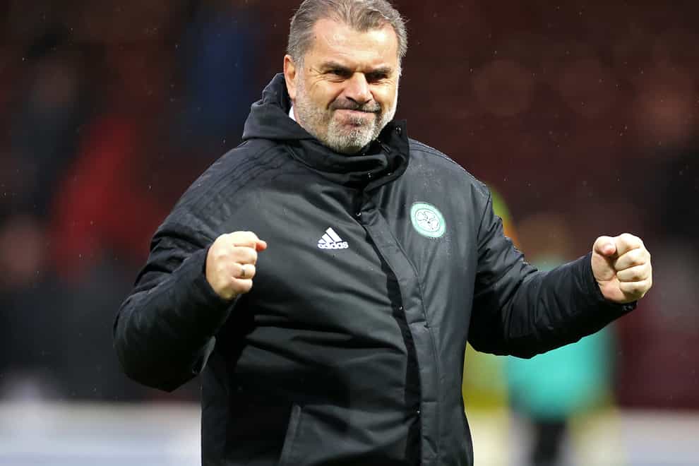 Celtic manager Ange Postecoglou celebrates victory at Fir Park (Steve Welsh/PA)