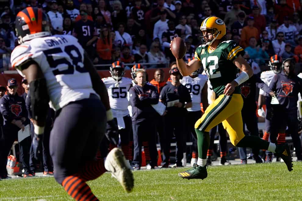 Aaron Rodgers ran in a touchdown as the Green Bay Packers beat the Chicago Bears (David Banks/AP)