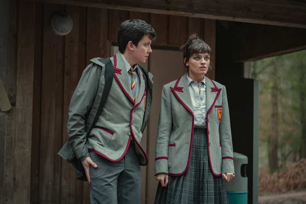 Asa Butterfield as Otis Milburn and Emma Mackey as Maeve Wiley (Netflix/PA)