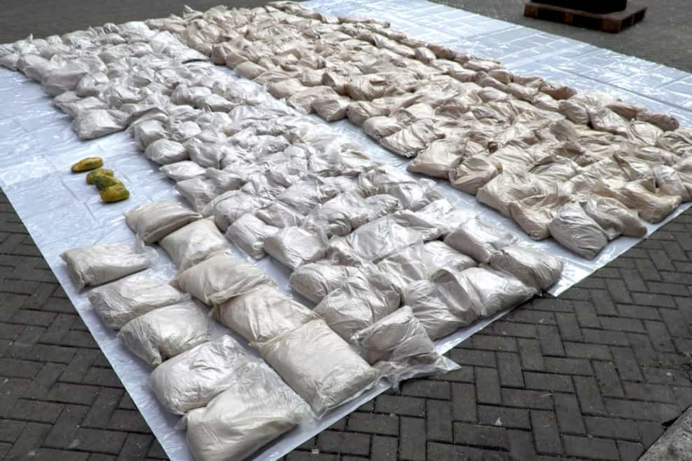 A haul of heroin that was hidden inside bags of rice seized from a container ship at the port of Felixstowe (National Crime Agency)