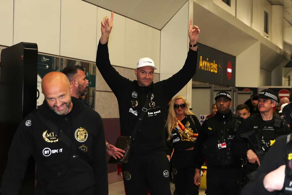 Tyson Fury, pictured acknowledging the crowd at Manchester Airport after returning from his trilogy fight with Deontay Wilder, could return to the ring next spring (Peter Byrne/PA)