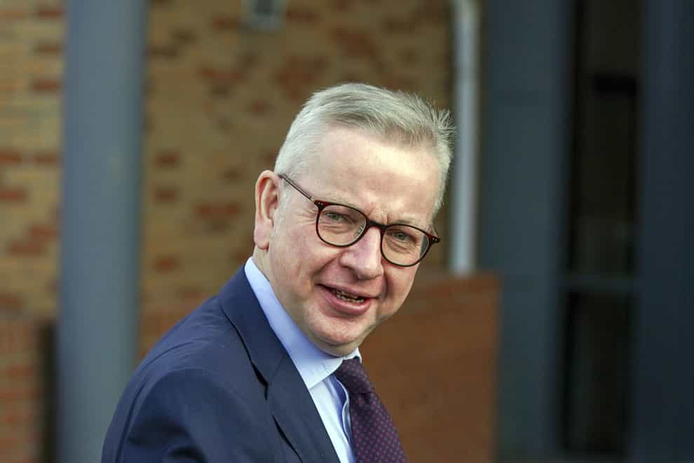 Communities Secretary Michael Gove had to be escorted by police after he was approached by protesters (Steve Parsons/PA)