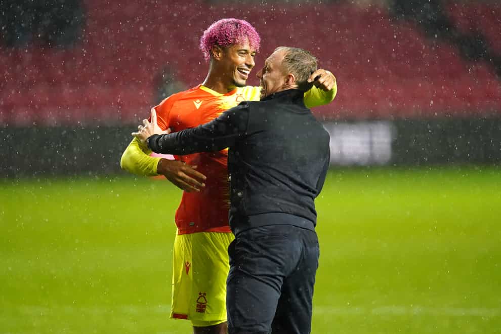 Nottingham Forest’s Lyle Taylor and manager Steve Cooper celebrate after they beat Bristol City (David Davies/PA)