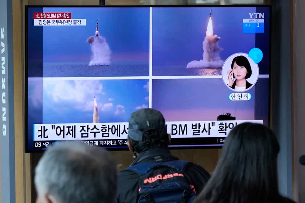 People in South Korea watch news reports of a missile test by the neighbouring North (AP Photo/Ahn Young-joon)