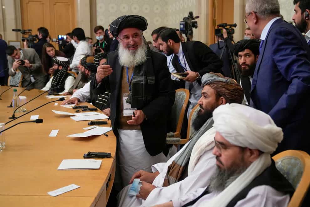 Members of the political delegation from the Taliban attend the talks in Moscow (AP Photo/Alexander Zemlianichenko, Pool)