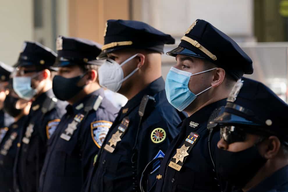New York City police officers have been told to get vaccinated against Covid or face being put on unpaid leave (AP Photo/Mark Lennihan)