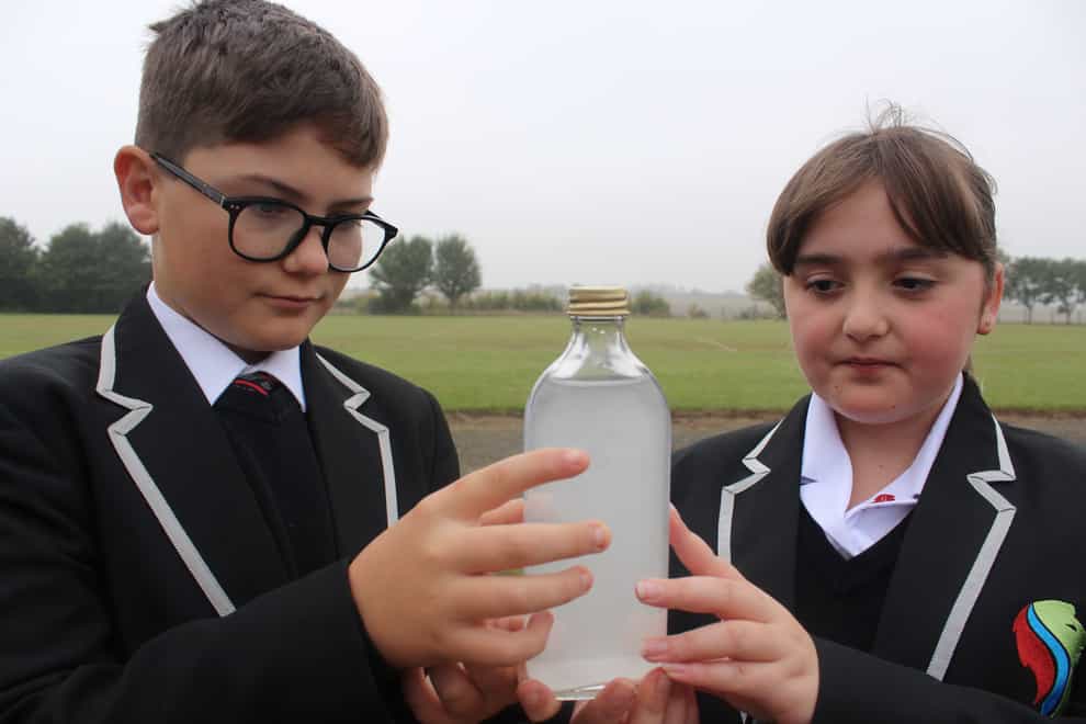 The pupils hope Cop26 President Alok Sharma will receive the bottle (Stamford Welland Academy/PA)