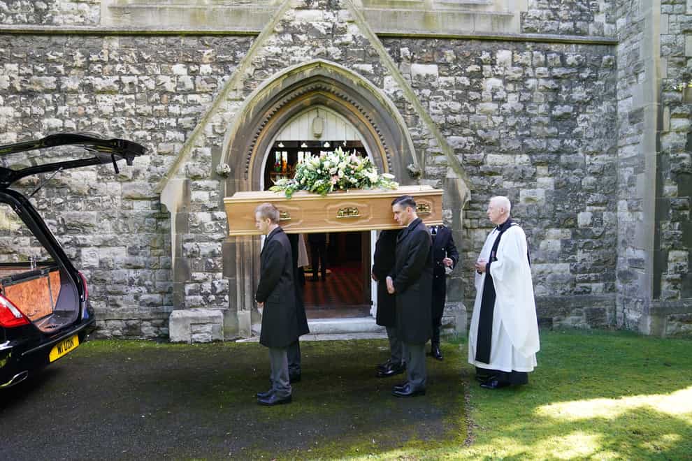 The coffin of James Brokenshire is carried from St John the Evangelist Church in Bexley, south-east London, after his funeral (Stefan Rousseau/PA)