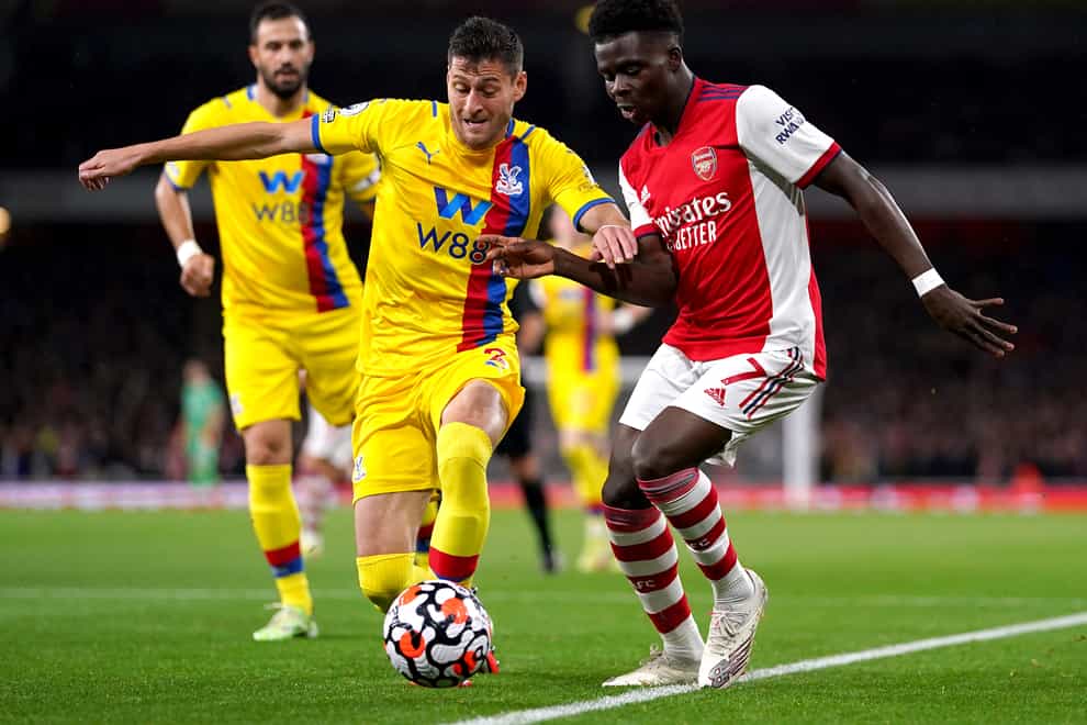 Bukayo Saka, right, is dealing with a knock (Adam Davy/PA)