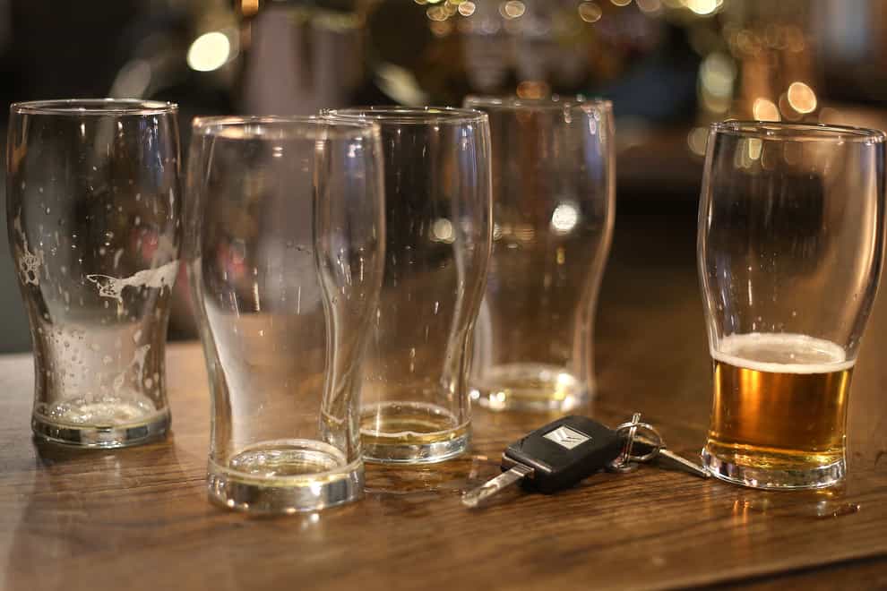 Beer glasses and a set of car keys (Philip Toscano/PA)