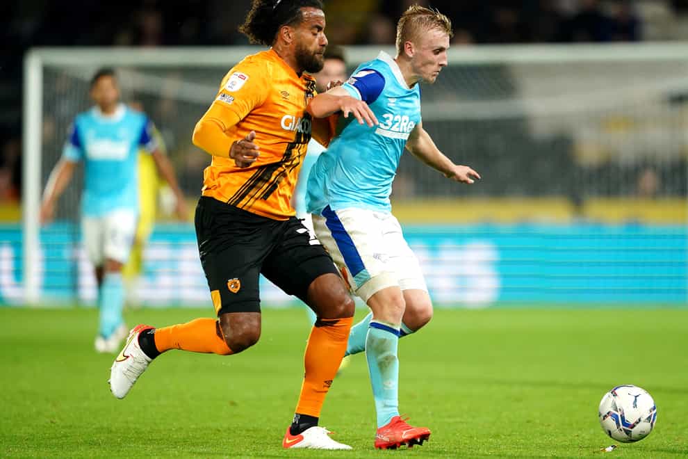 Tom Huddlestone, left, has been sidelined by the recurrence of a hamstring injury (Zac Goodwin/PA)