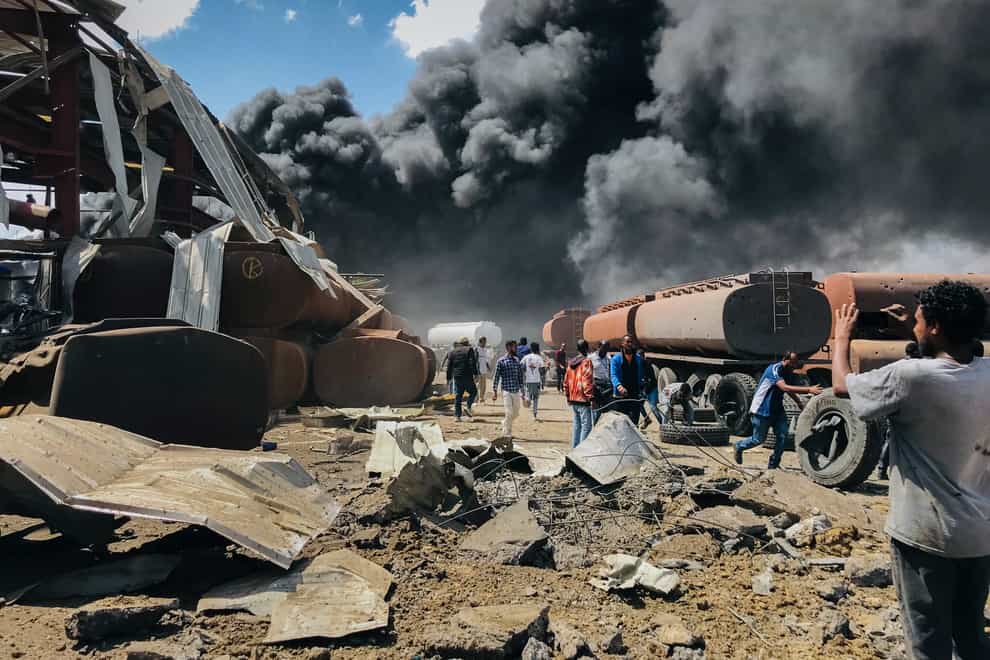 Clouds of black smoke from fires in the aftermath of an airstrike in Mekele (AP)