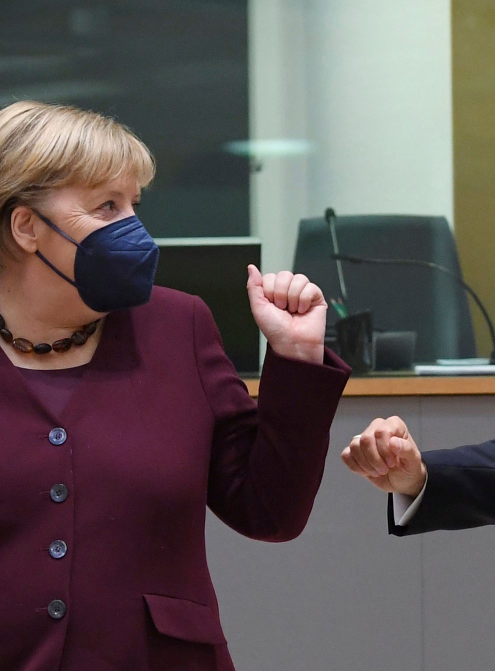 German chancellor Angela Merkel, left, and French president Emmanuel Macron, at the EU summit in Brussels (John Thys, Pool Photo via AP)