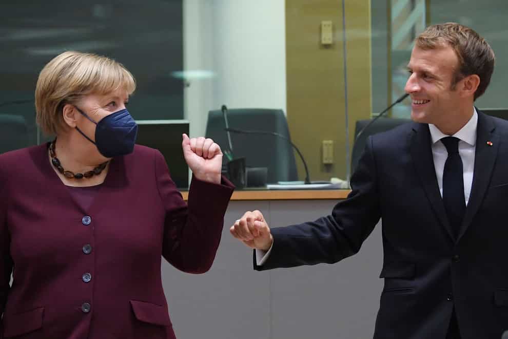 German chancellor Angela Merkel, left, and French president Emmanuel Macron, at the EU summit in Brussels (John Thys, Pool Photo via AP)